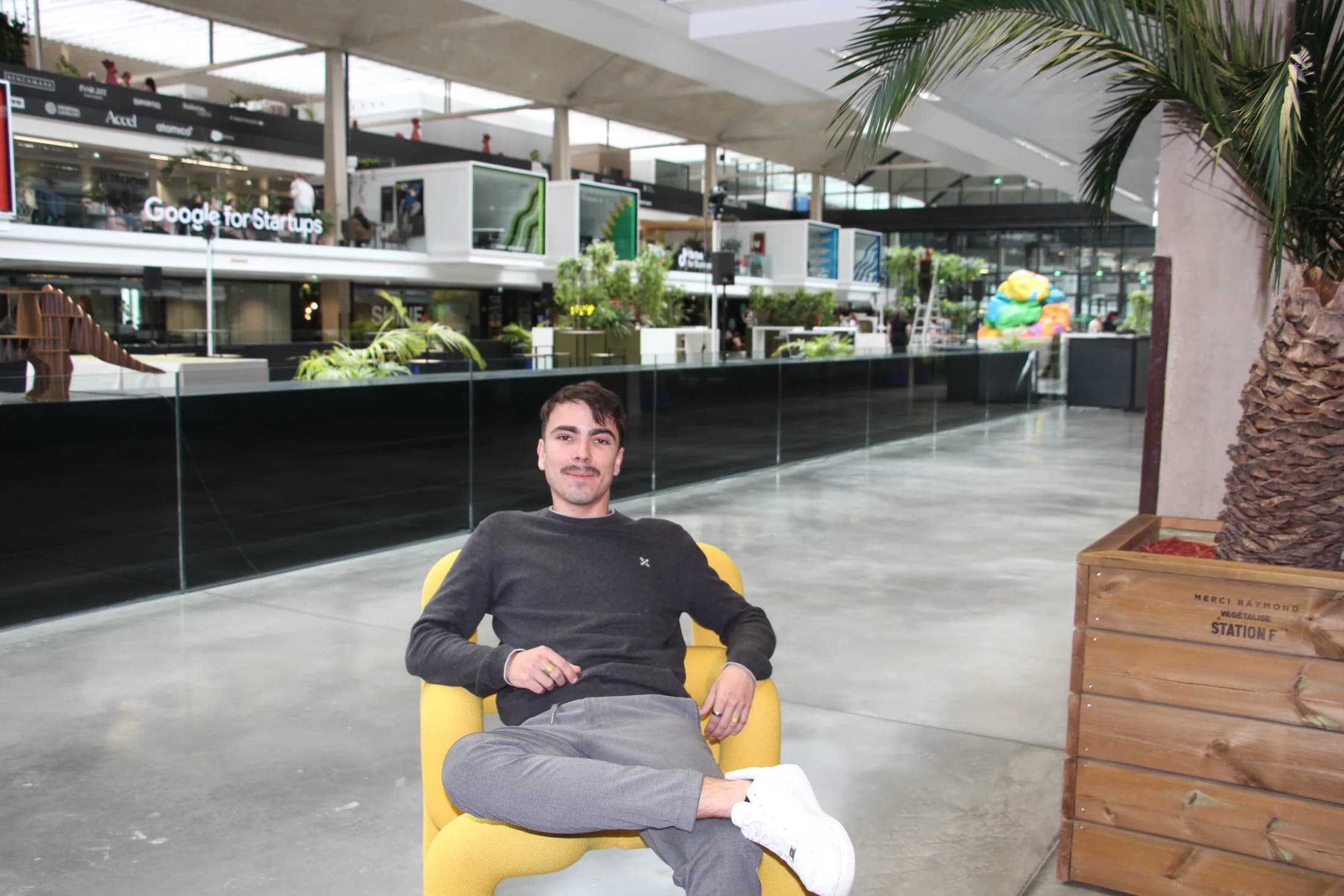 Kylian Migot seated in a bright workspace in Paris